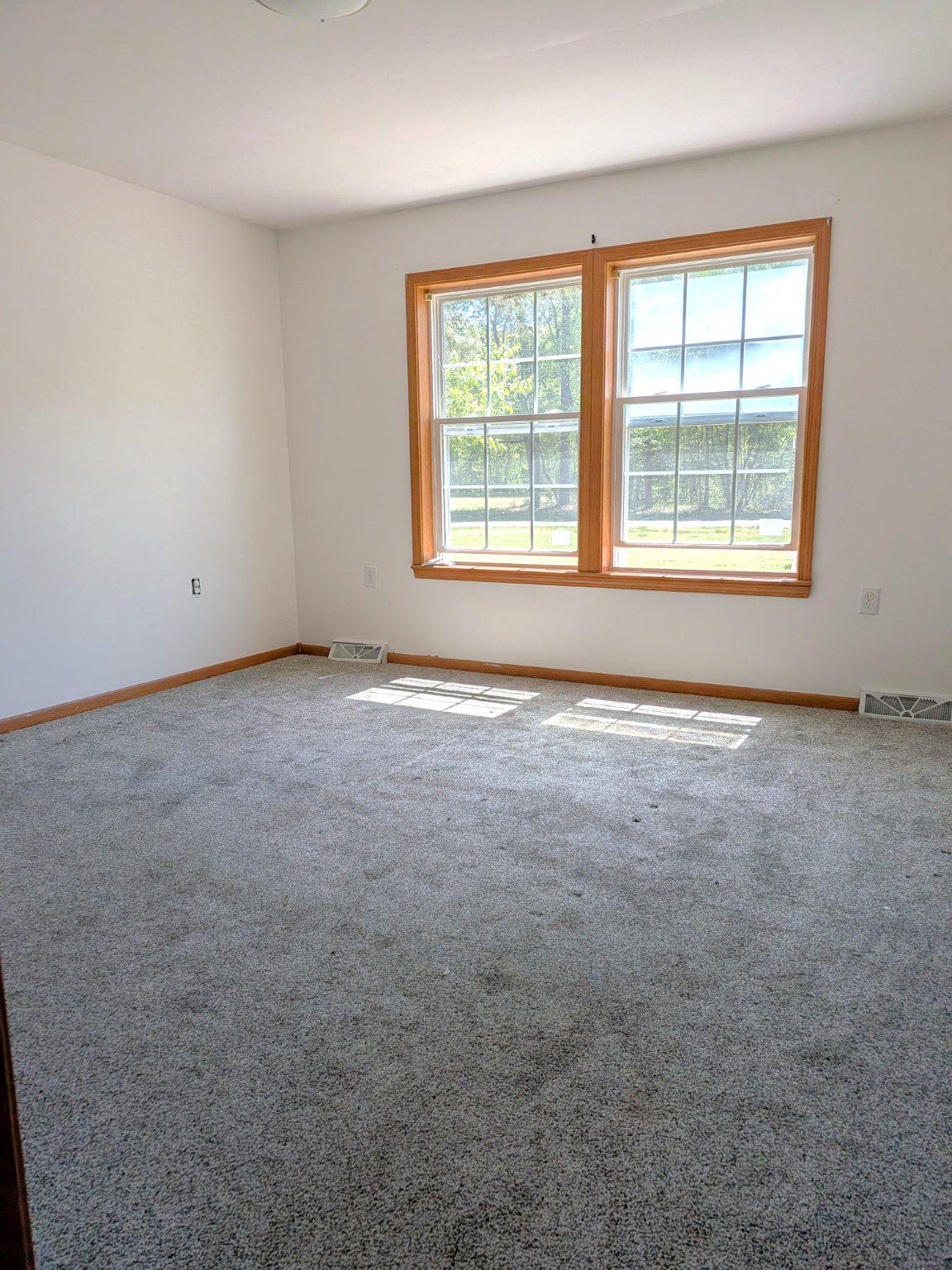 575 Jackson Ditch Road Harrington, DE 19952 - Photo 17 of 39 an empty room with windows