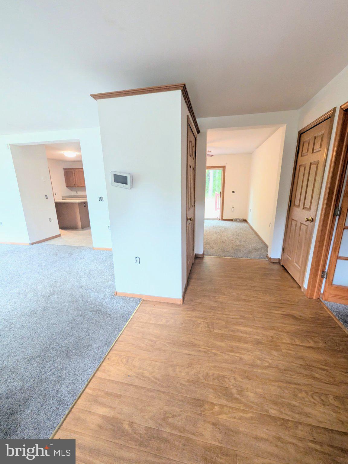 575 Jackson Ditch Road Harrington, DE 19952 - Photo 3 of 39 a view of a big room with closet and mirror