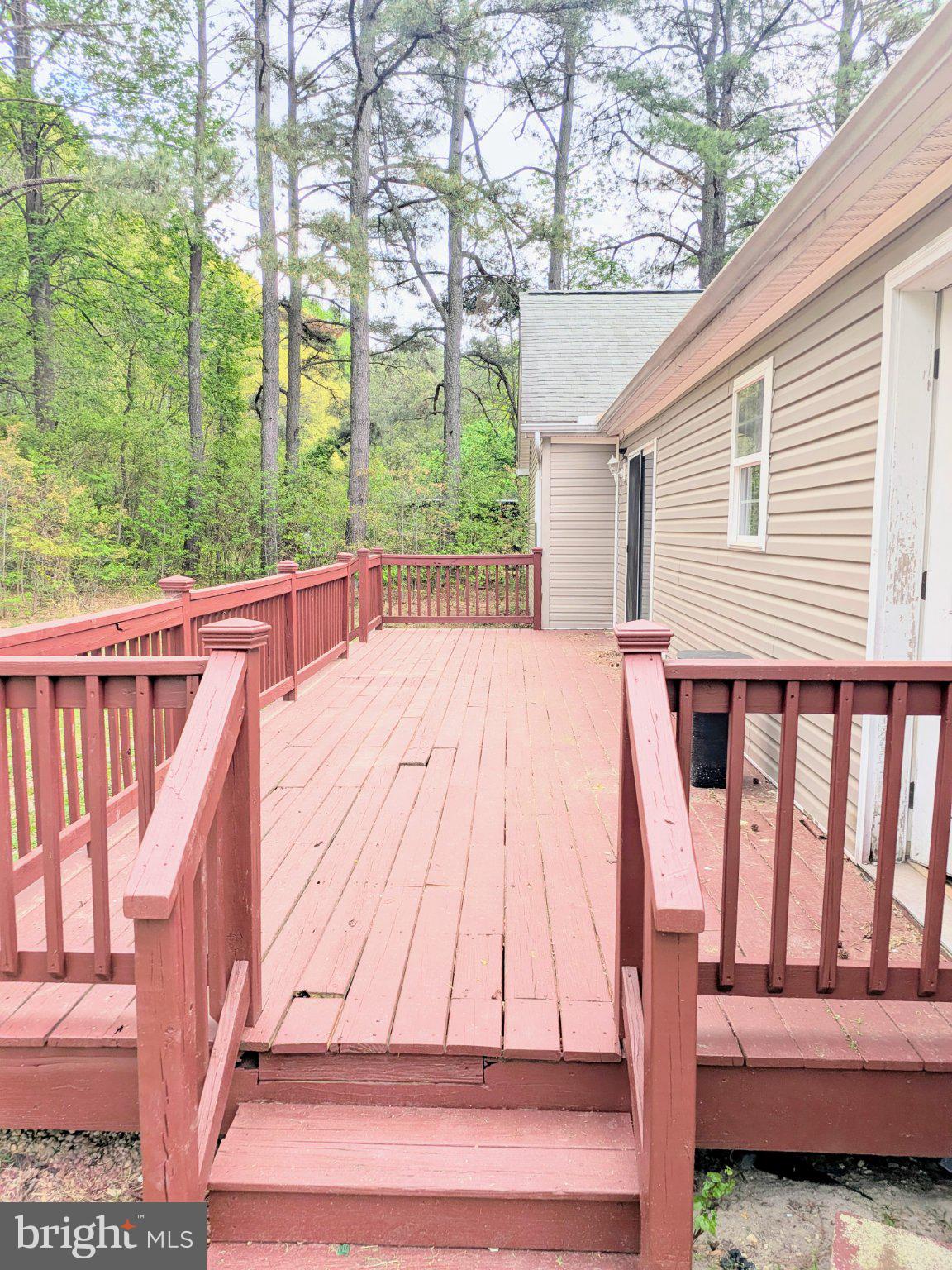 575 Jackson Ditch Road Harrington, DE 19952 - Photo 38 of 39 a view of backyard with deck and outdoor seating
