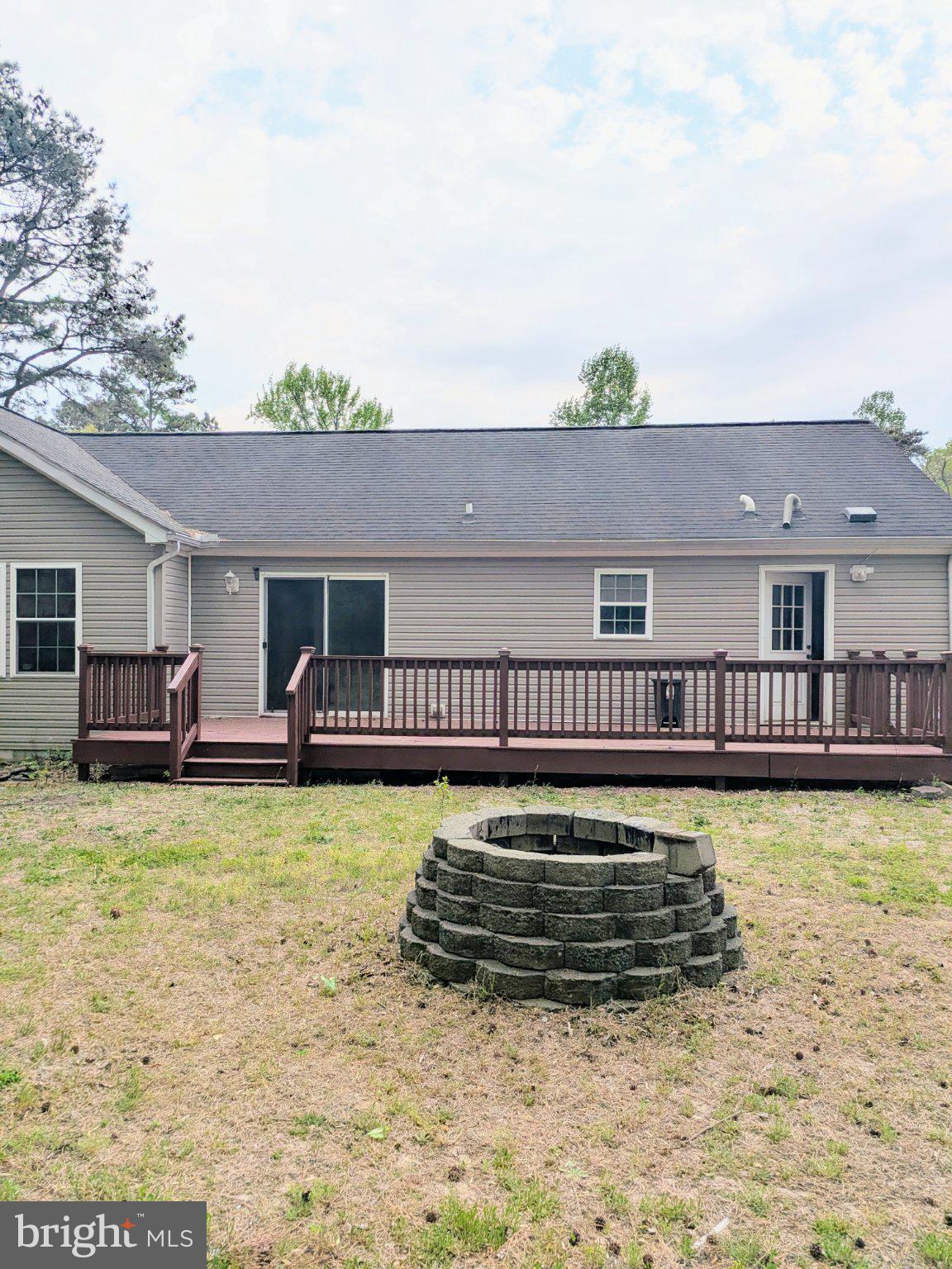575 Jackson Ditch Road Harrington, DE 19952 - Photo 39 of 39 a view of a house with swimming pool in front of it