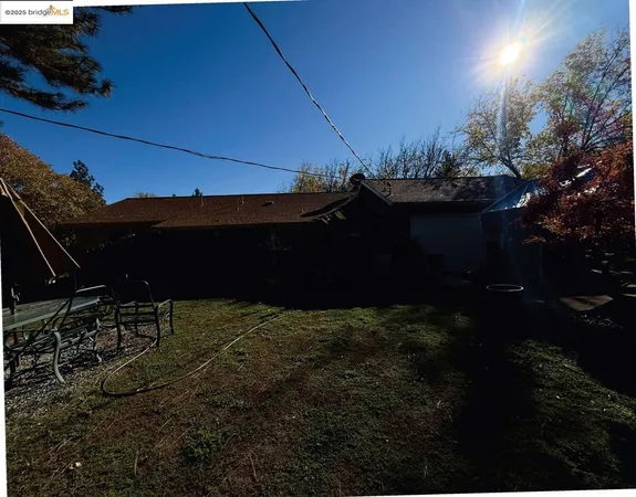 a view of a backyard of a house