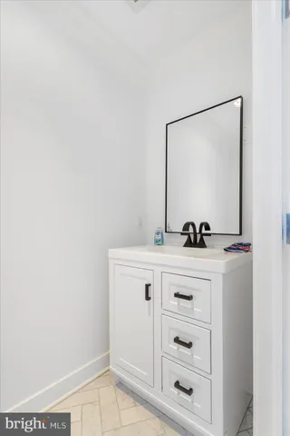 a view of dresser with mirror