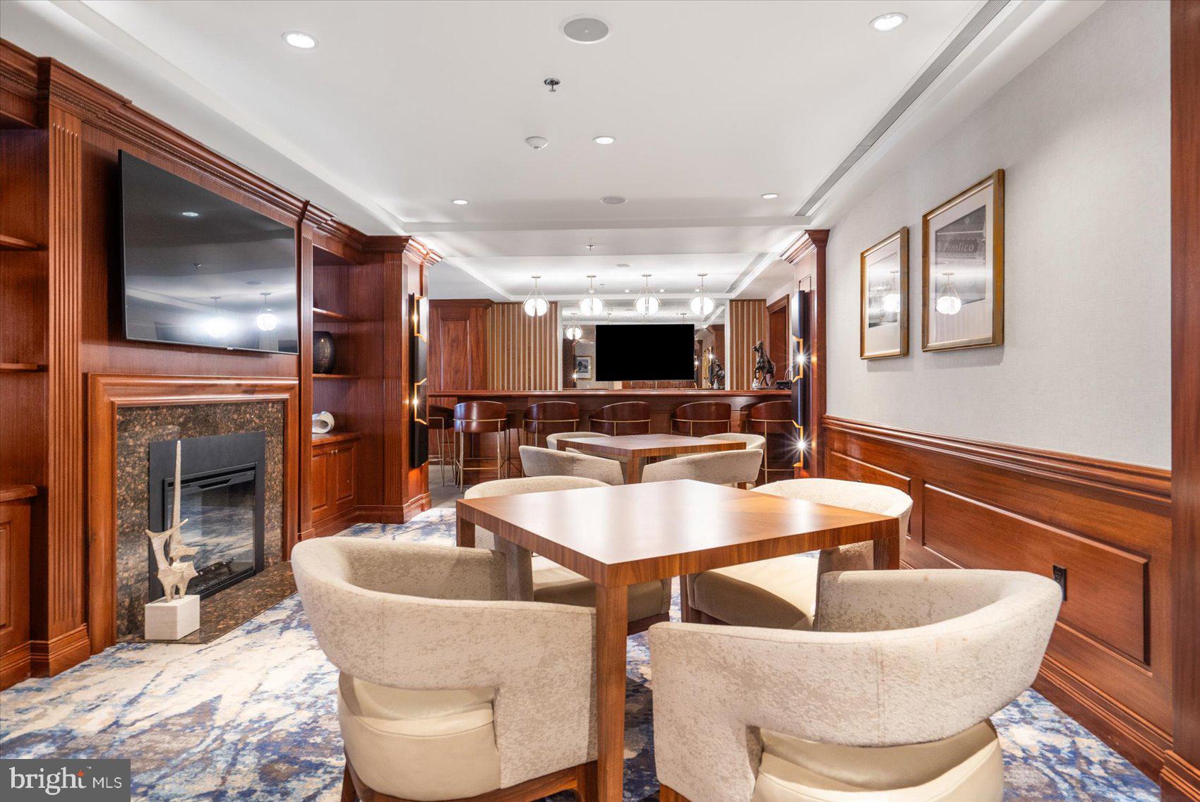 801 Key Highway, Unit T63 Baltimore, MD 21230 - Photo 39 of 43 a kitchen with granite countertop a sink and a refrigerator