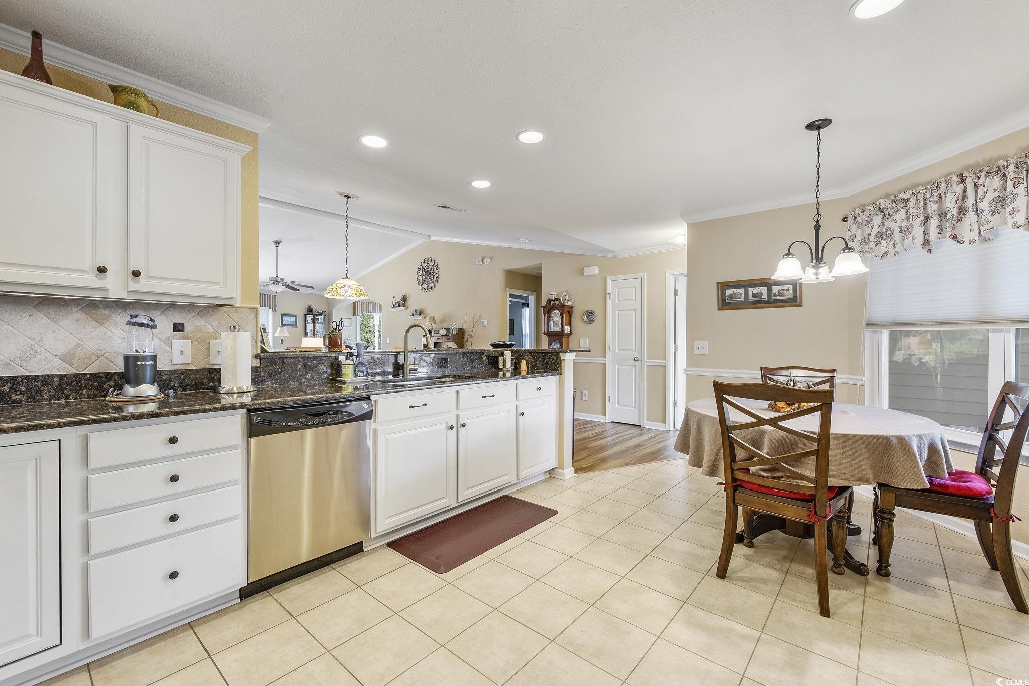 749 Bonita Loop Myrtle Beach, SC 29588 - Photo 11 of 37 Kitchen featuring pendant lighting, sink, white ca