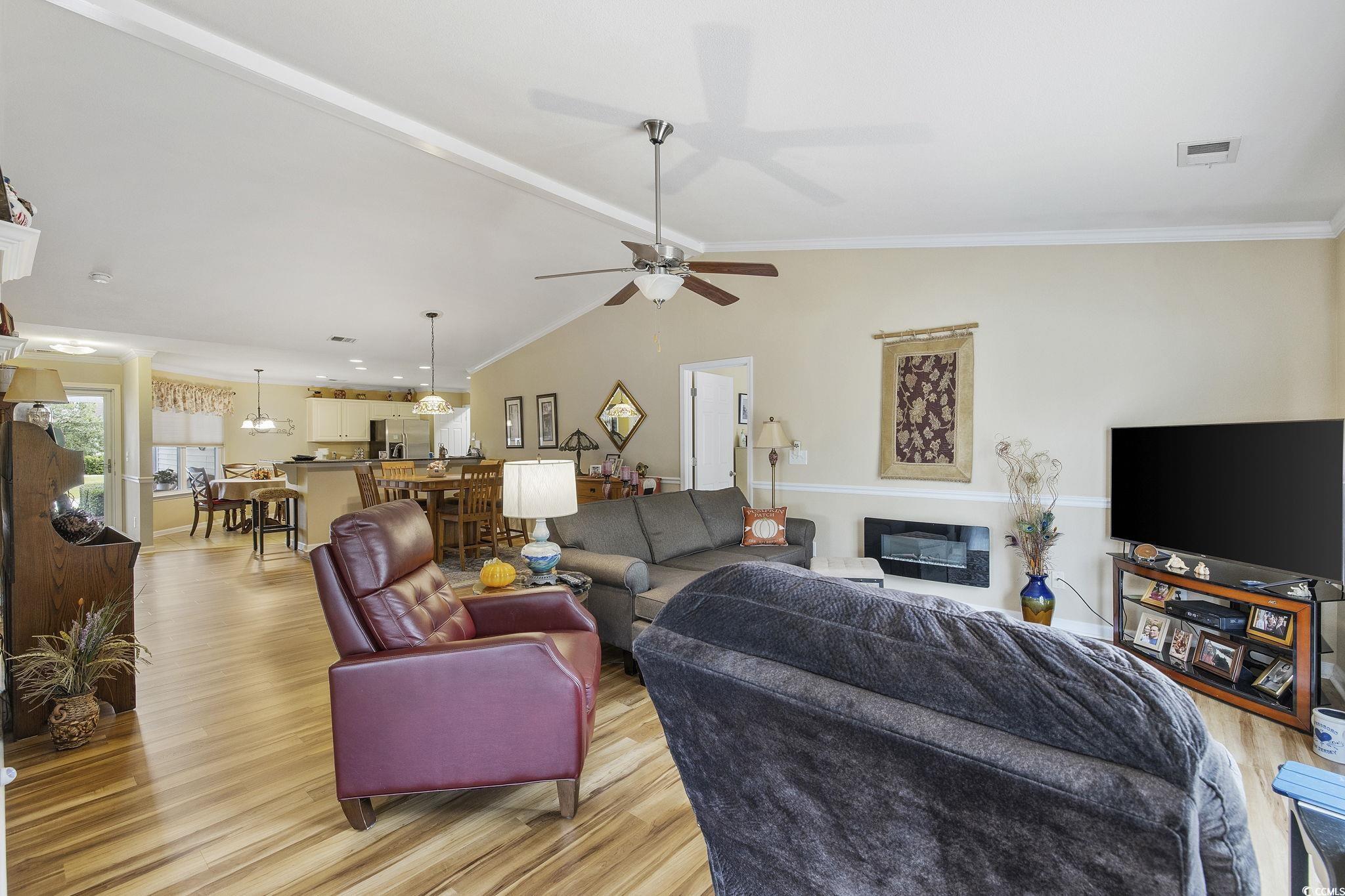749 Bonita Loop Myrtle Beach, SC 29588 - Photo 12 of 37 Living room featuring ceiling fan, lofted ceiling,