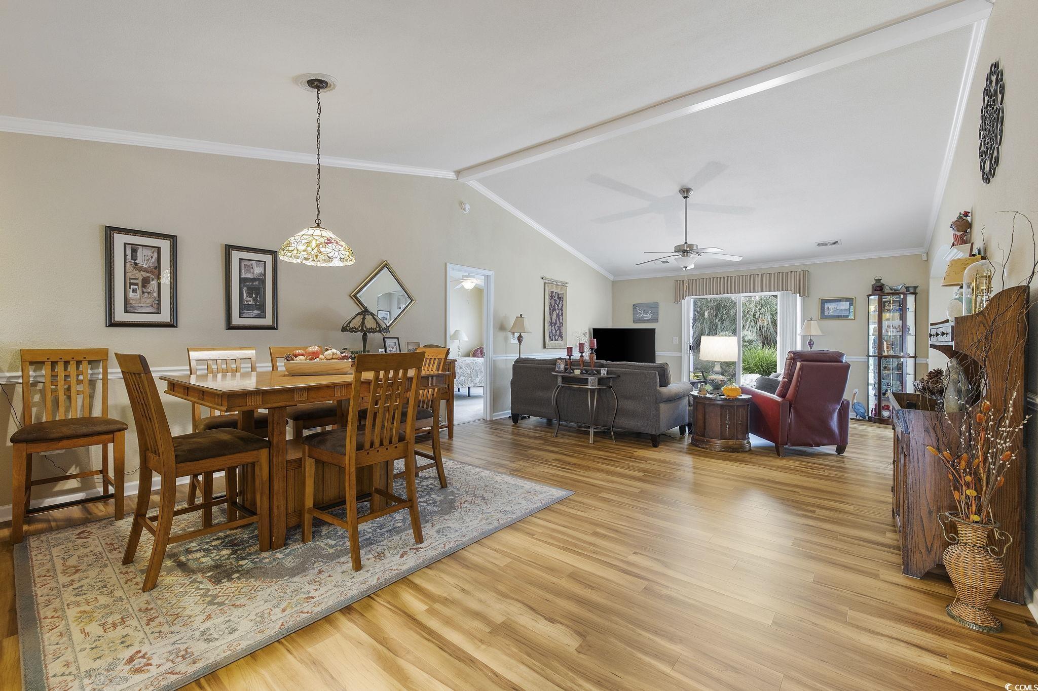 749 Bonita Loop Myrtle Beach, SC 29588 - Photo 14 of 37 Dining space with ceiling fan, vaulted ceiling wit