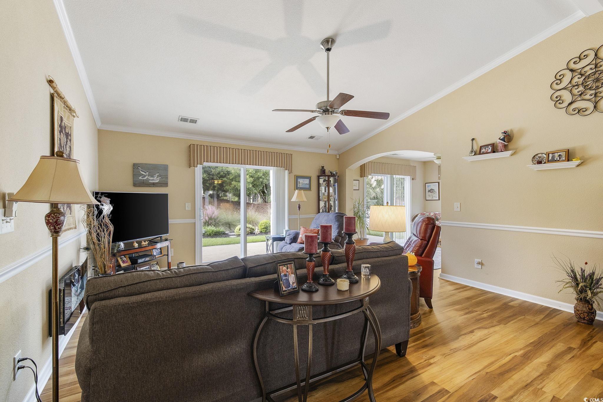 749 Bonita Loop Myrtle Beach, SC 29588 - Photo 16 of 37 Living room with ceiling fan, a healthy amount of