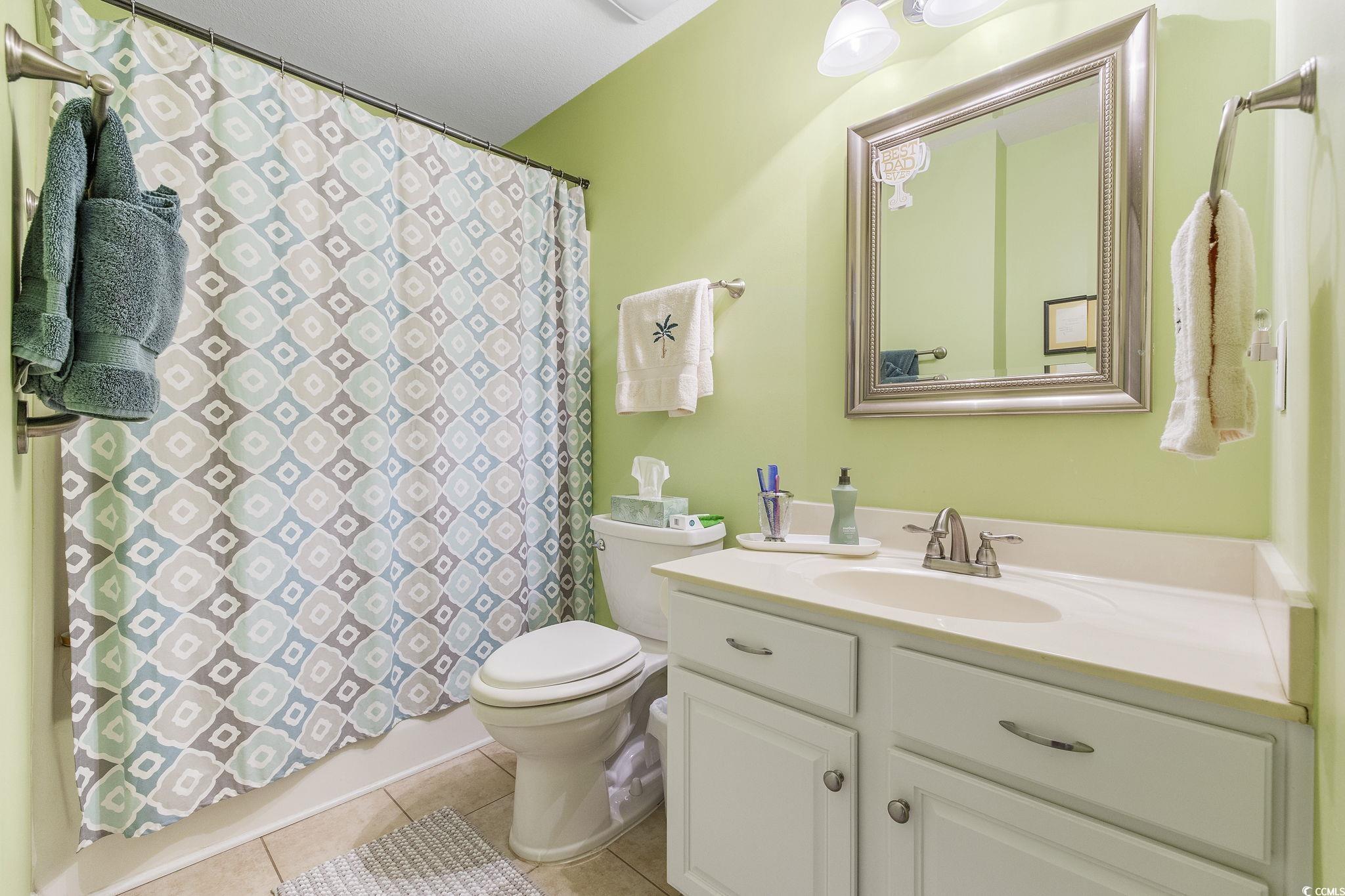 749 Bonita Loop Myrtle Beach, SC 29588 - Photo 18 of 37 Full bathroom featuring shower / tub combo, tile p
