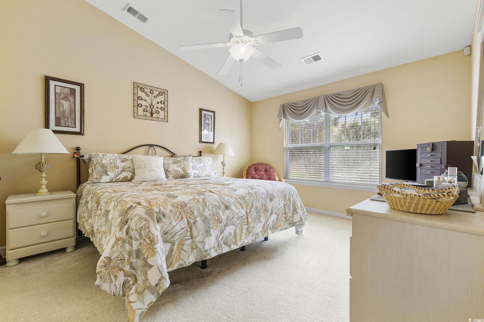 749 Bonita Loop Myrtle Beach, SC 29588 - Photo 19 of 37 Bedroom featuring ceiling fan, vaulted ceiling, an