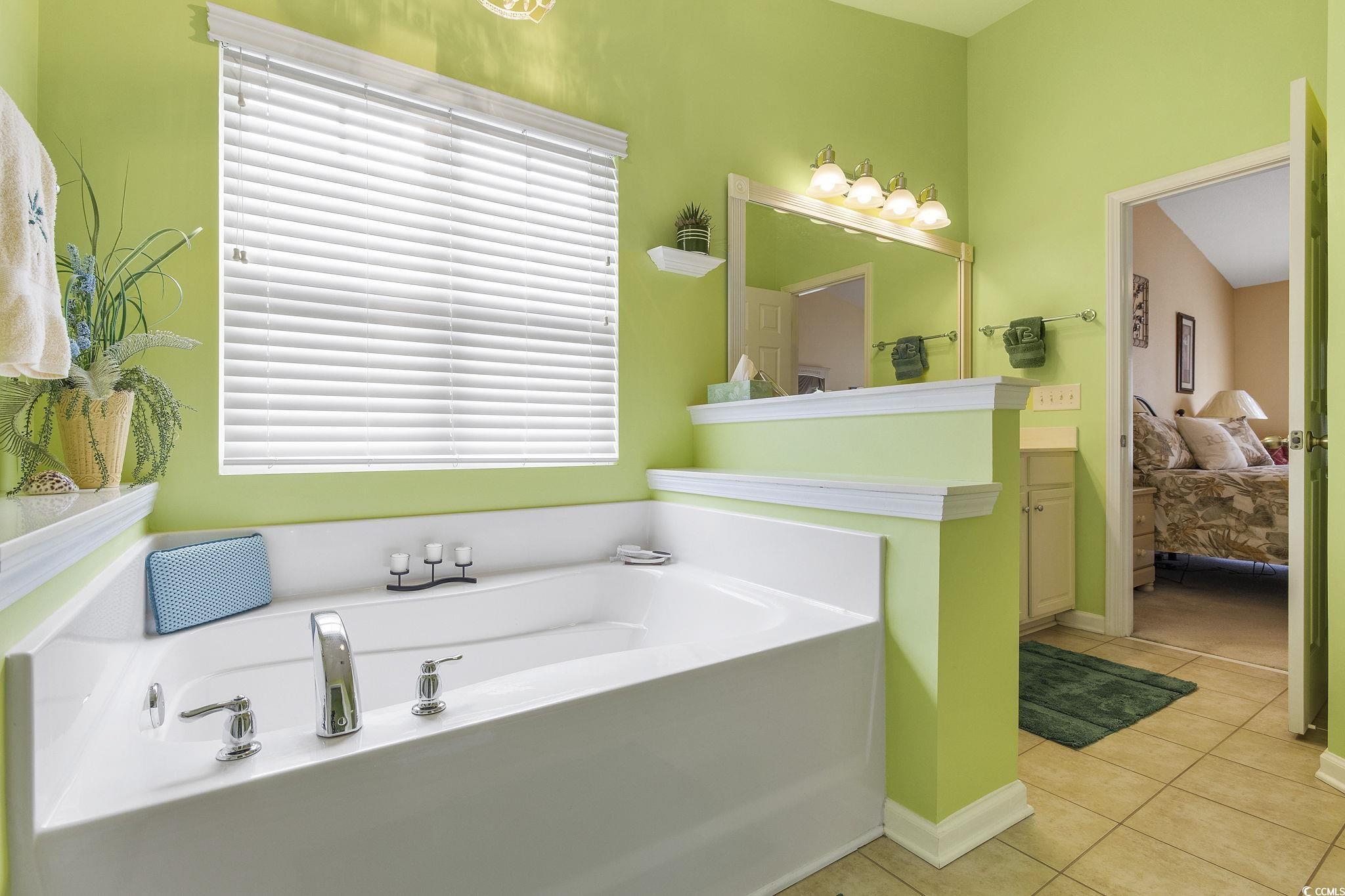 749 Bonita Loop Myrtle Beach, SC 29588 - Photo 22 of 37 Bathroom featuring tile patterned flooring and a t