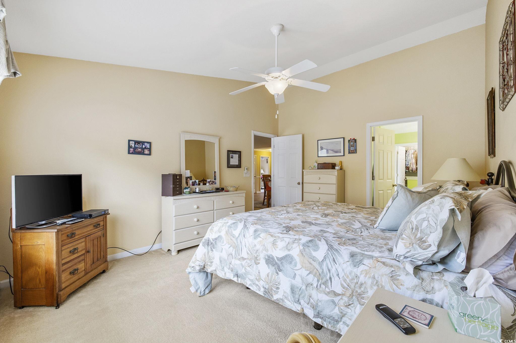 749 Bonita Loop Myrtle Beach, SC 29588 - Photo 24 of 37 Bedroom with ceiling fan and light colored carpet