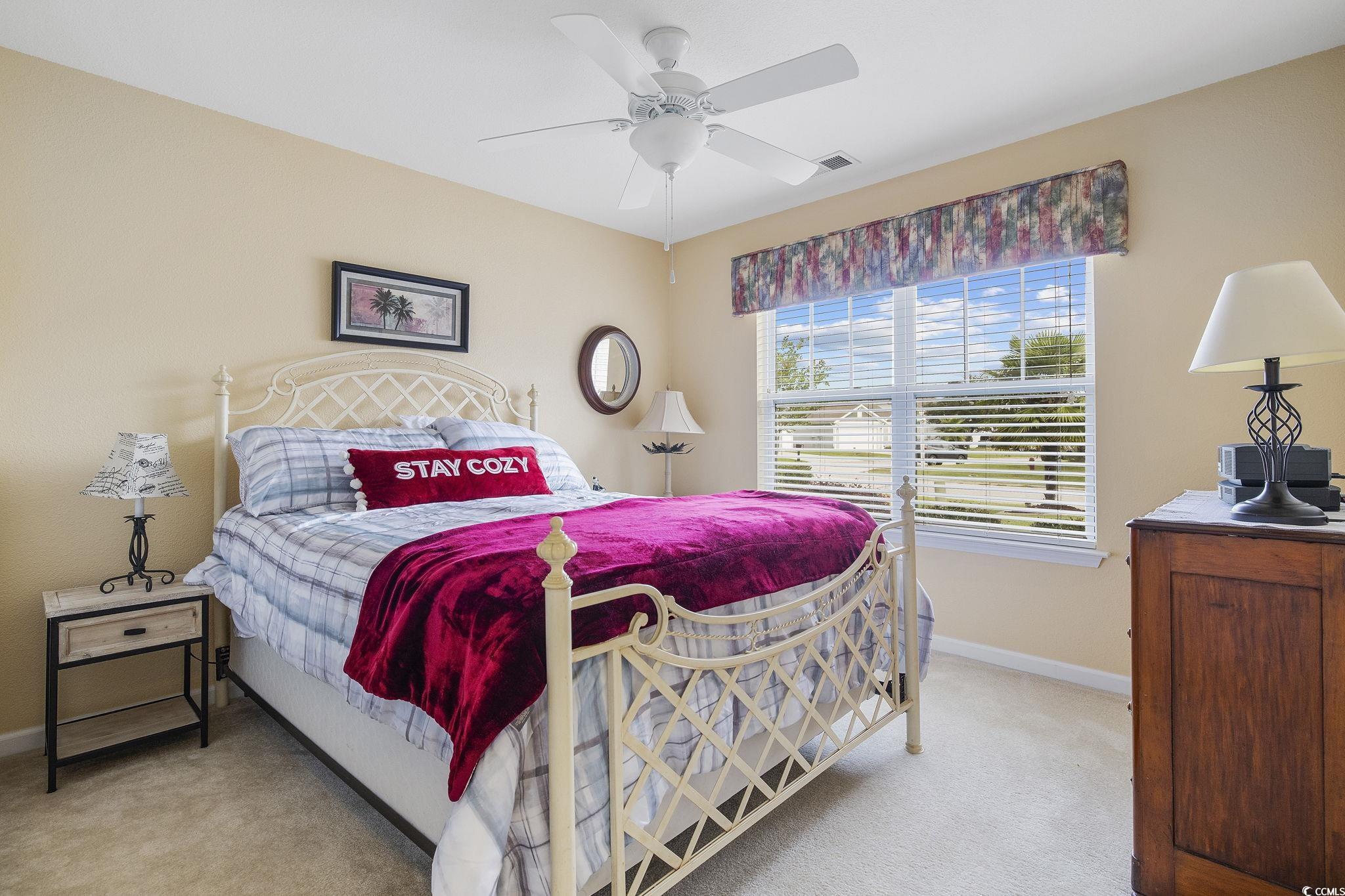 749 Bonita Loop Myrtle Beach, SC 29588 - Photo 25 of 37 Bedroom with ceiling fan and light carpet