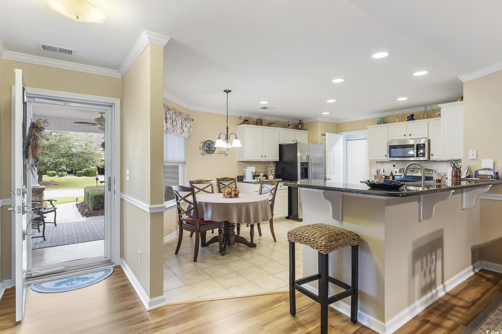 749 Bonita Loop Myrtle Beach, SC 29588 - Photo 7 of 37 Kitchen featuring pendant lighting, appliances wit