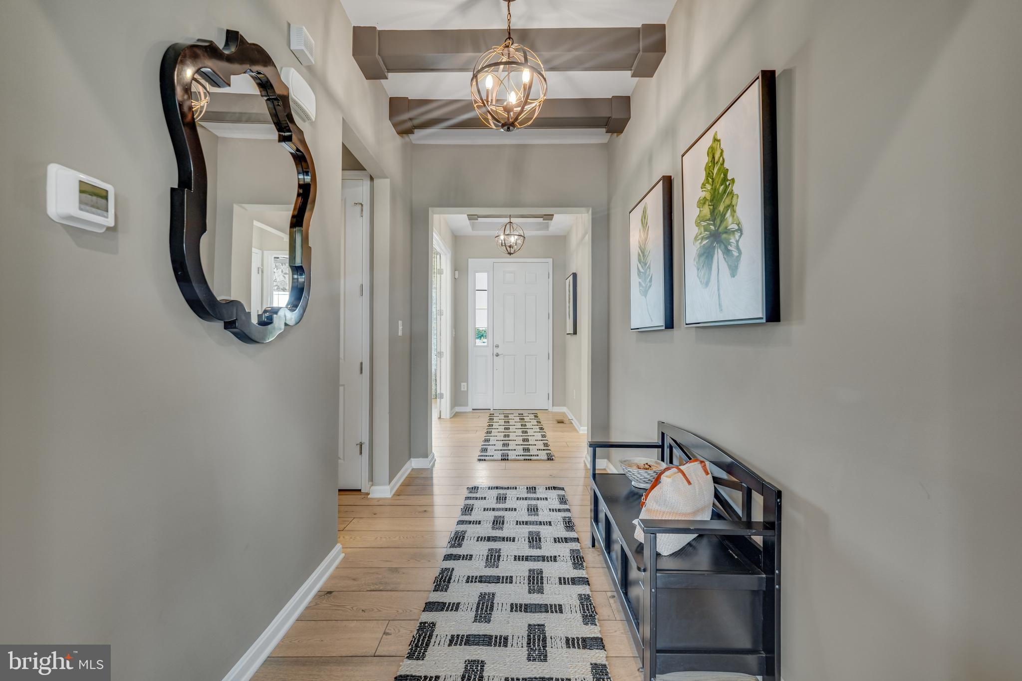 772 Honey Locust Road Middletown, DE 19709 - Photo 2 of 18 a view of a hallway with windows