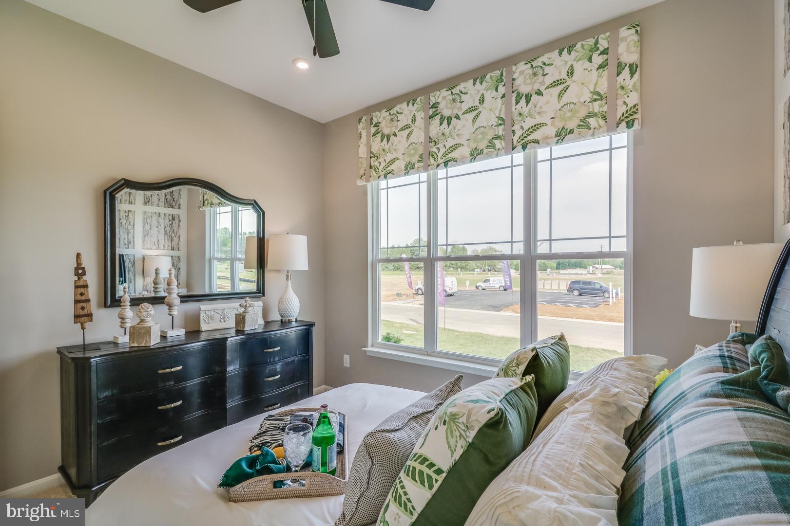 772 Honey Locust Road Middletown, DE 19709 - Photo 9 of 18 a living room with furniture and a large window