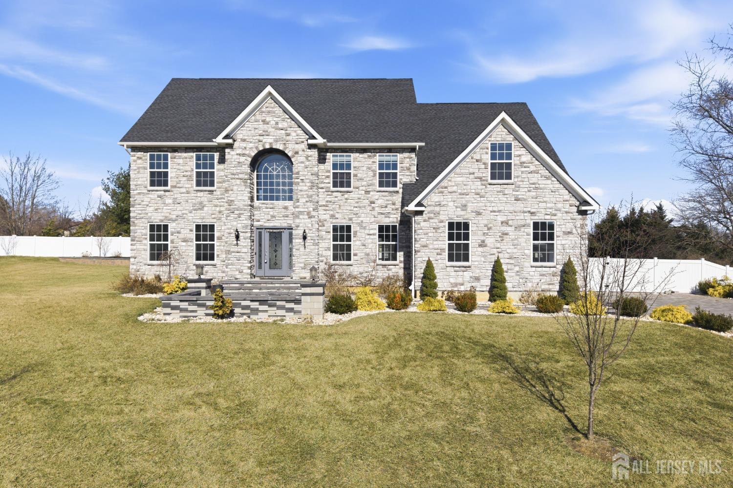 29 May Road East Brunswick, NJ 08816 - Photo 1 of 48 front view of a house with a yard