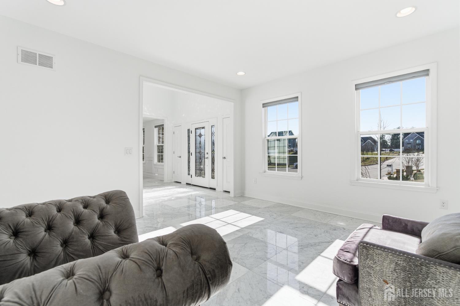 29 May Road East Brunswick, NJ 08816 - Photo 13 of 48 a living room with furniture and next to a window