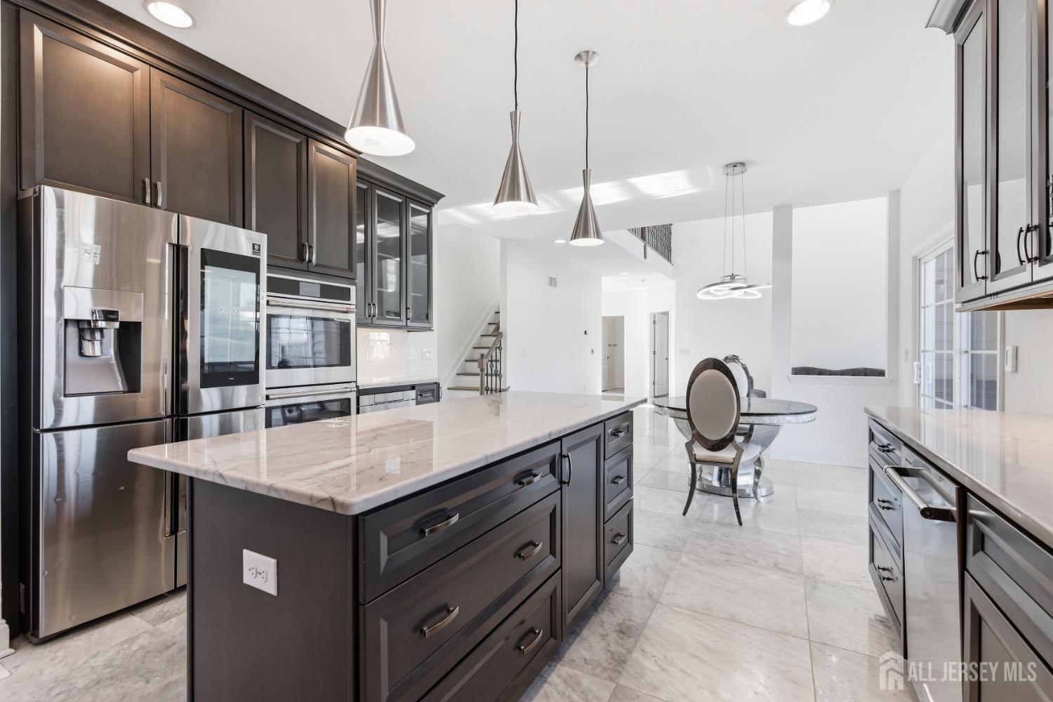 29 May Road East Brunswick, NJ 08816 - Photo 17 of 48 a kitchen with stainless steel appliances a sink stove and refrigerator
