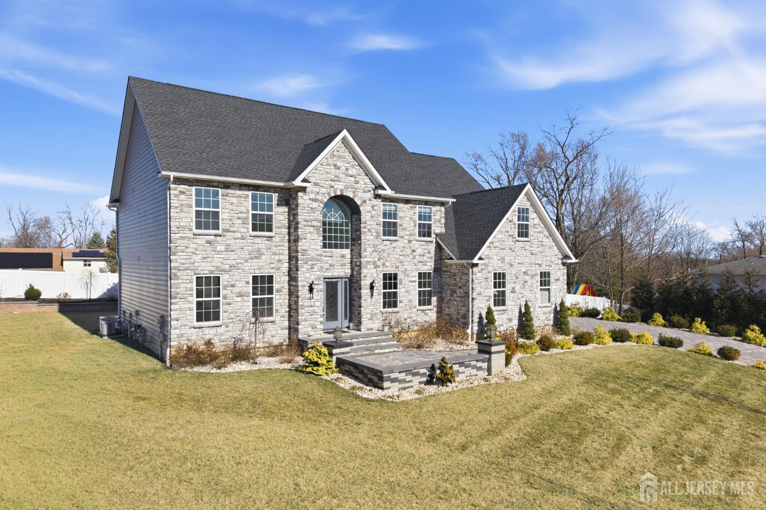 29 May Road East Brunswick, NJ 08816 - Photo 3 of 48 a view of a house with swimming pool and sitting area