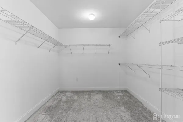 a view of a room with racks on the wall