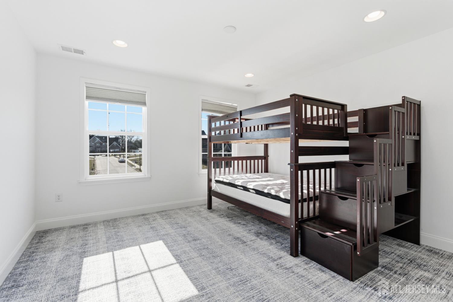 29 May Road East Brunswick, NJ 08816 - Photo 36 of 48 a view of staircase with white walls and a window