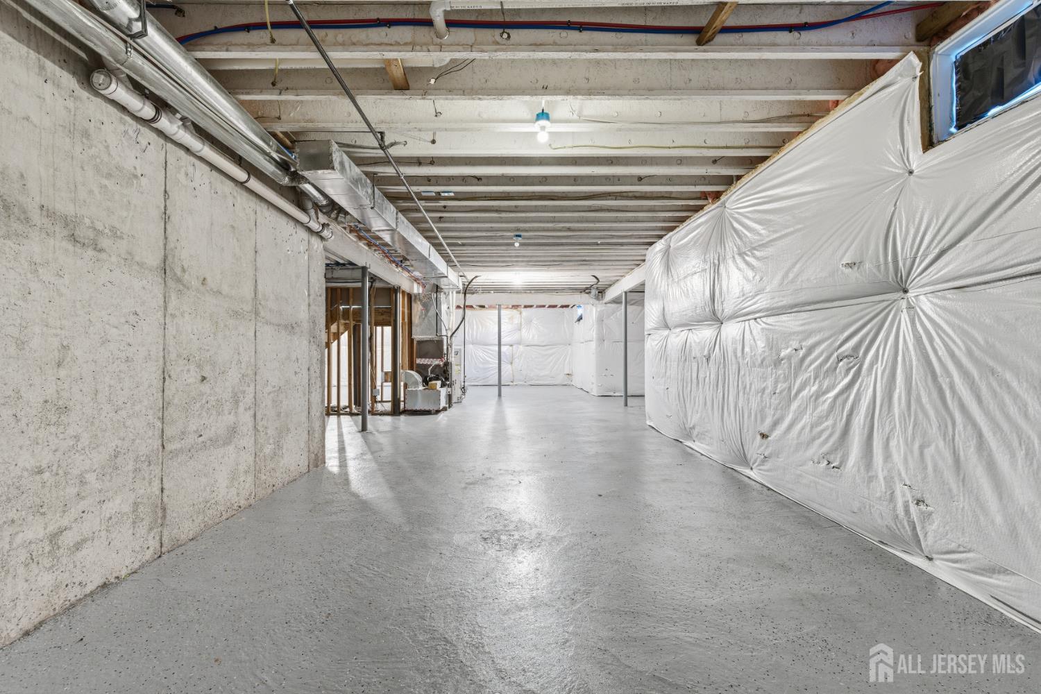 29 May Road East Brunswick, NJ 08816 - Photo 40 of 48 a view of a hallway with wooden floor