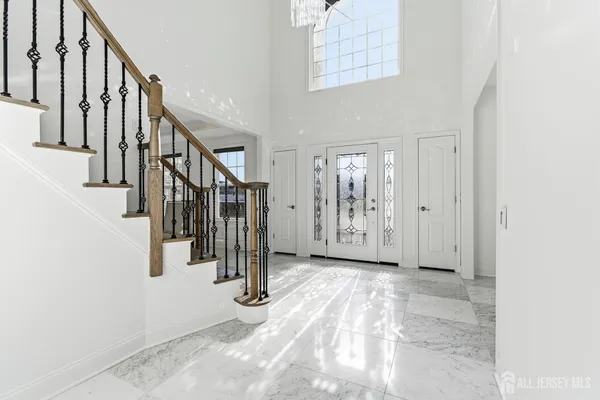 a view of an entryway with stairs