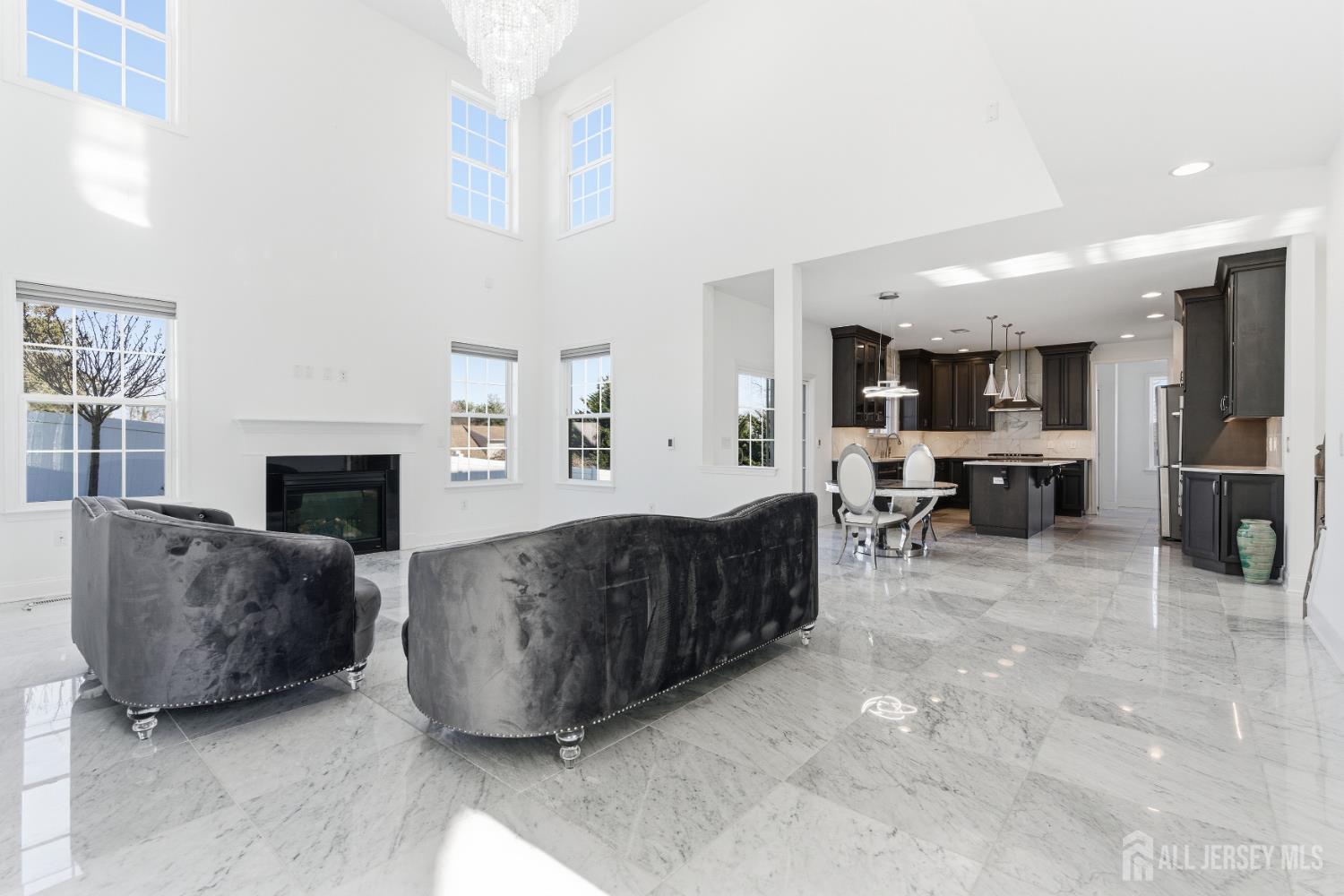 29 May Road East Brunswick, NJ 08816 - Photo 9 of 48 a living room with furniture and a fireplace