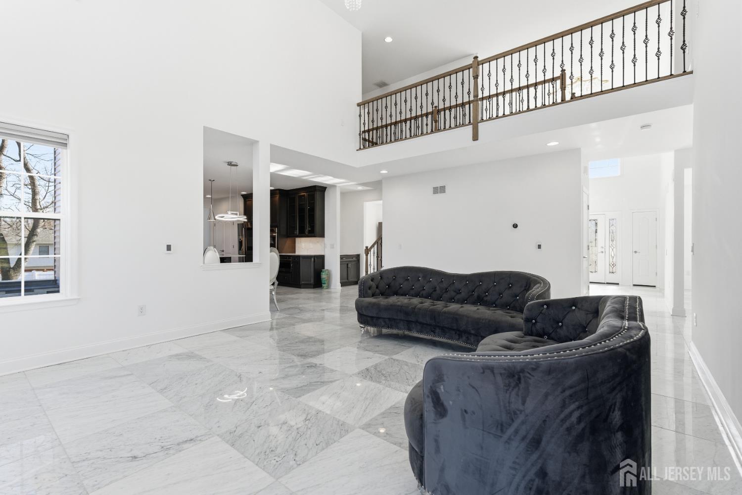29 May Road East Brunswick, NJ 08816 - Photo 10 of 48 a living room with furniture and a window
