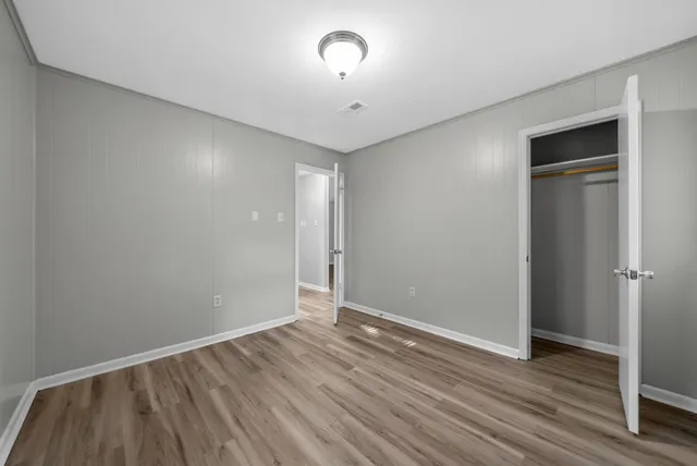 a view of room with hardwood floor