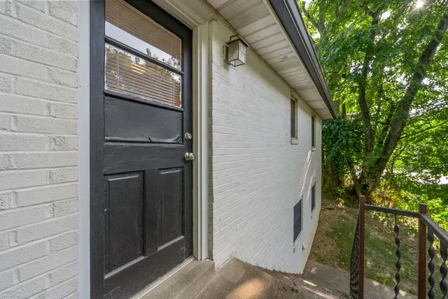 a view of stairs with seating space