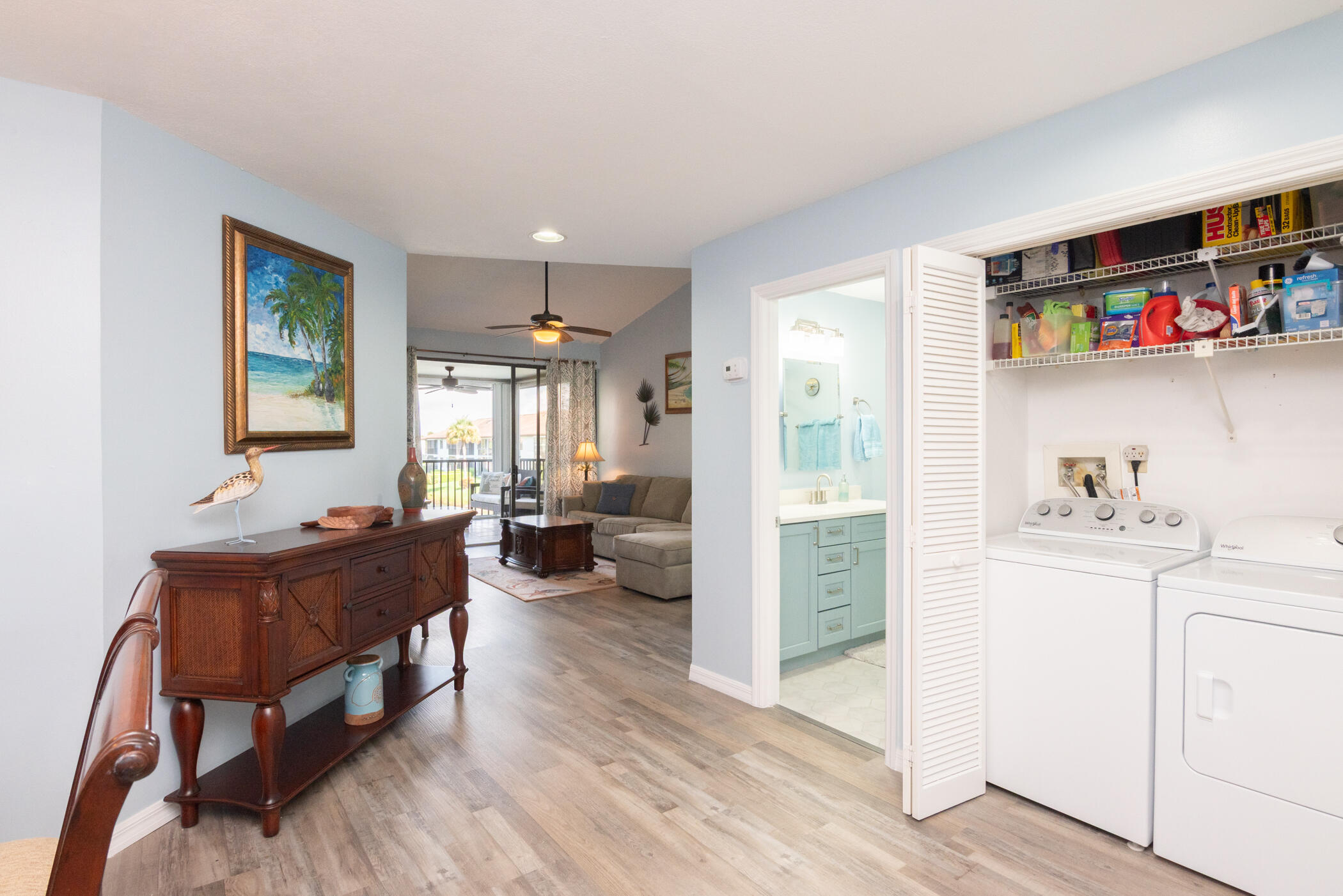 6041 Southeast Landing Way, Unit 17 Stuart, FL 34997 - Photo 12 of 37 a living room with furniture and a wooden floor
