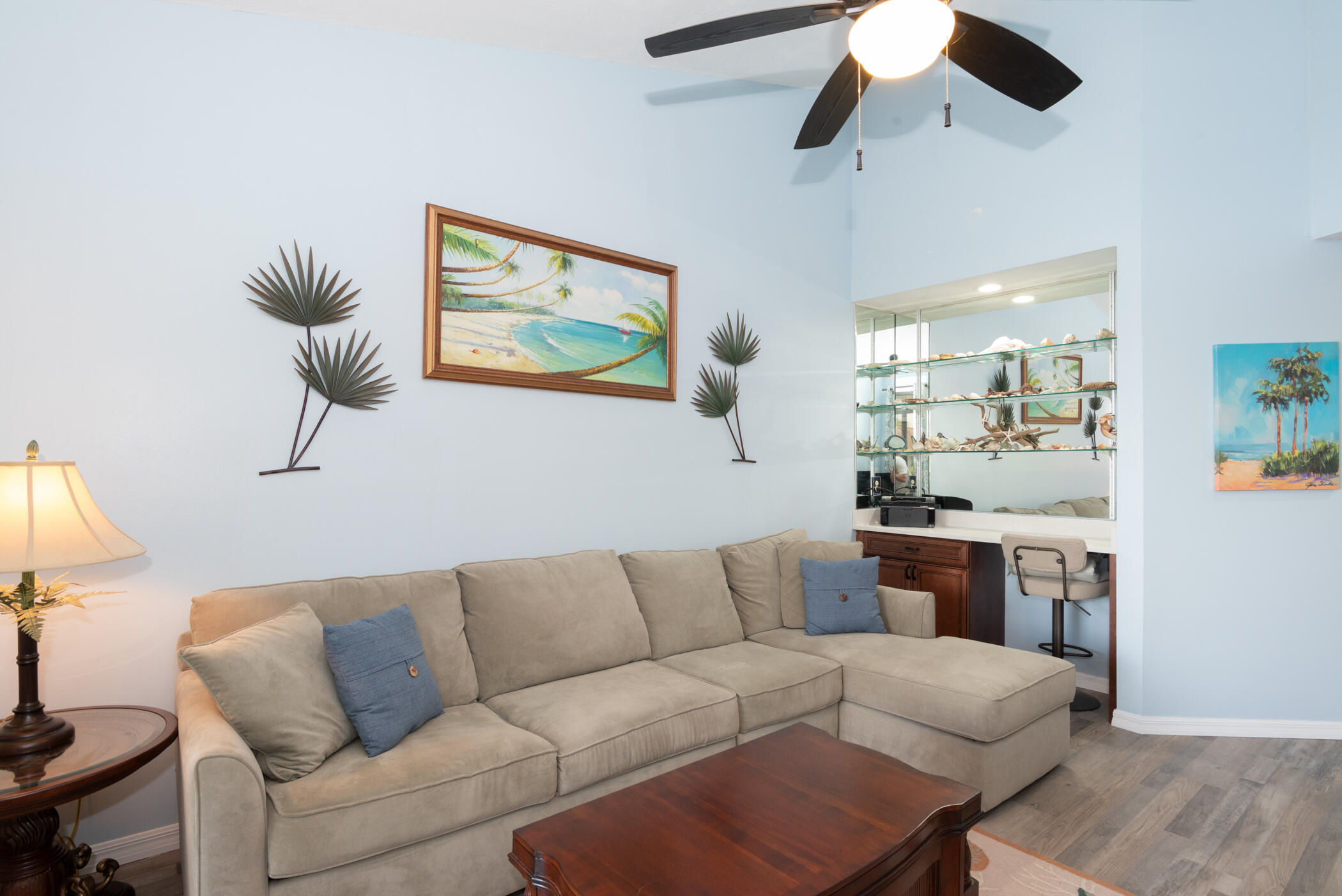 6041 Southeast Landing Way, Unit 17 Stuart, FL 34997 - Photo 16 of 37 a living room with stainless steel appliances kitchen island granite countertop furniture and a couch