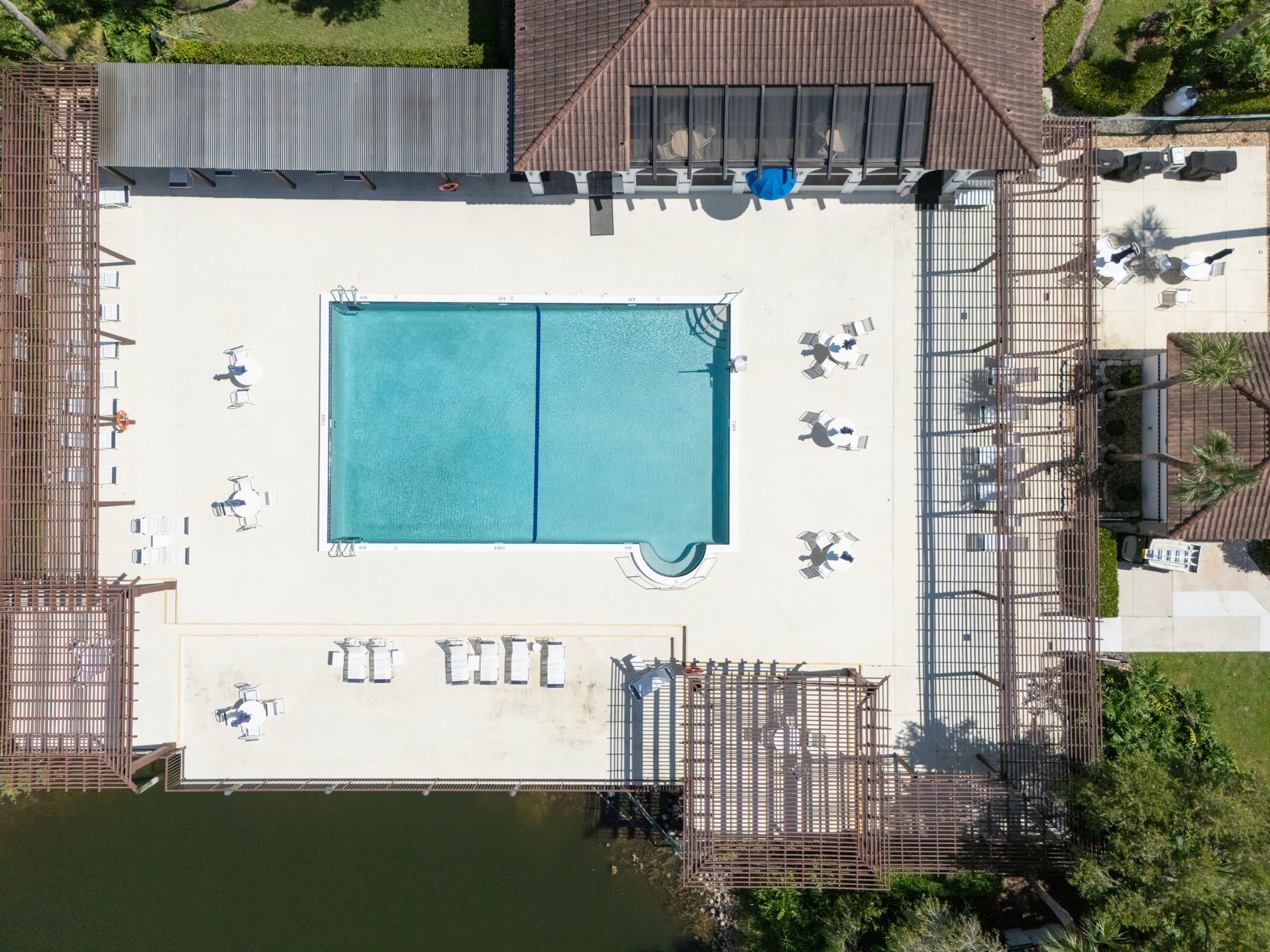 6041 Southeast Landing Way, Unit 17 Stuart, FL 34997 - Photo 34 of 37 a front view of a house with a yard