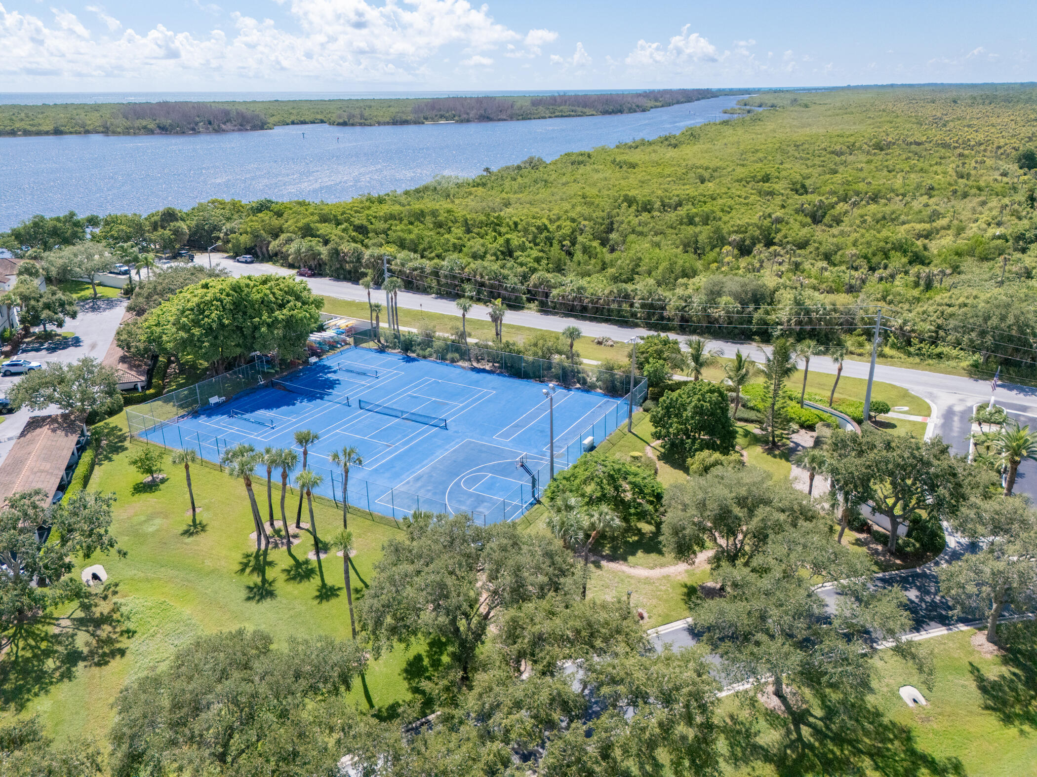 6041 Southeast Landing Way, Unit 17 Stuart, FL 34997 - Photo 36 of 37 a view of a garden with an outdoor space