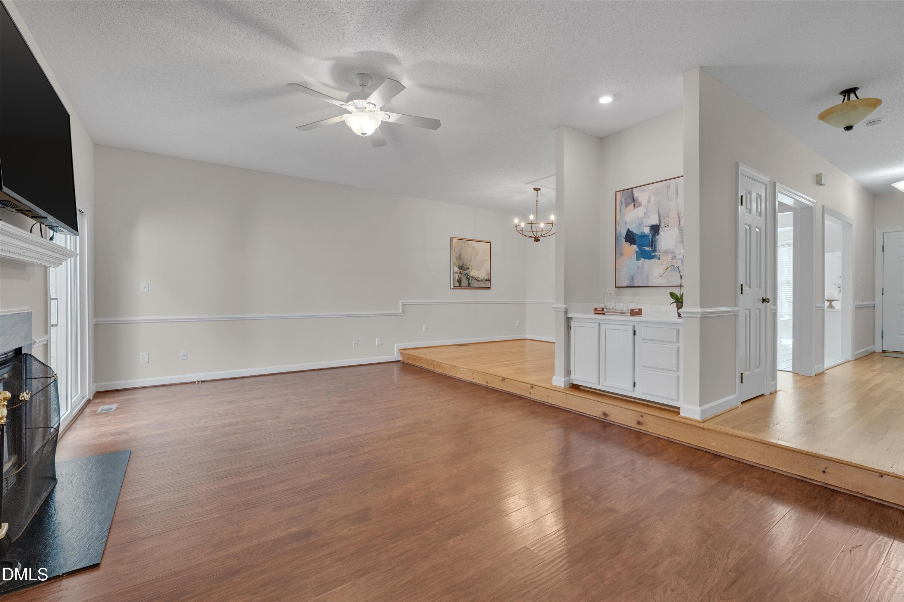 3 Preakness Drive Durham, NC 27713 - Photo 14 of 62 a view of a livingroom with a staircase