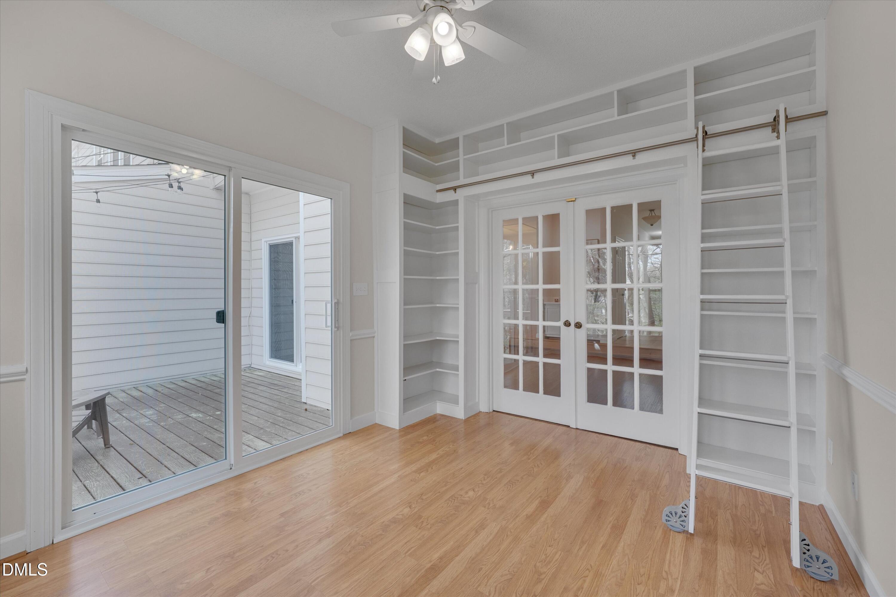 3 Preakness Drive Durham, NC 27713 - Photo 18 of 62 a view of an empty room with wooden floor and a window