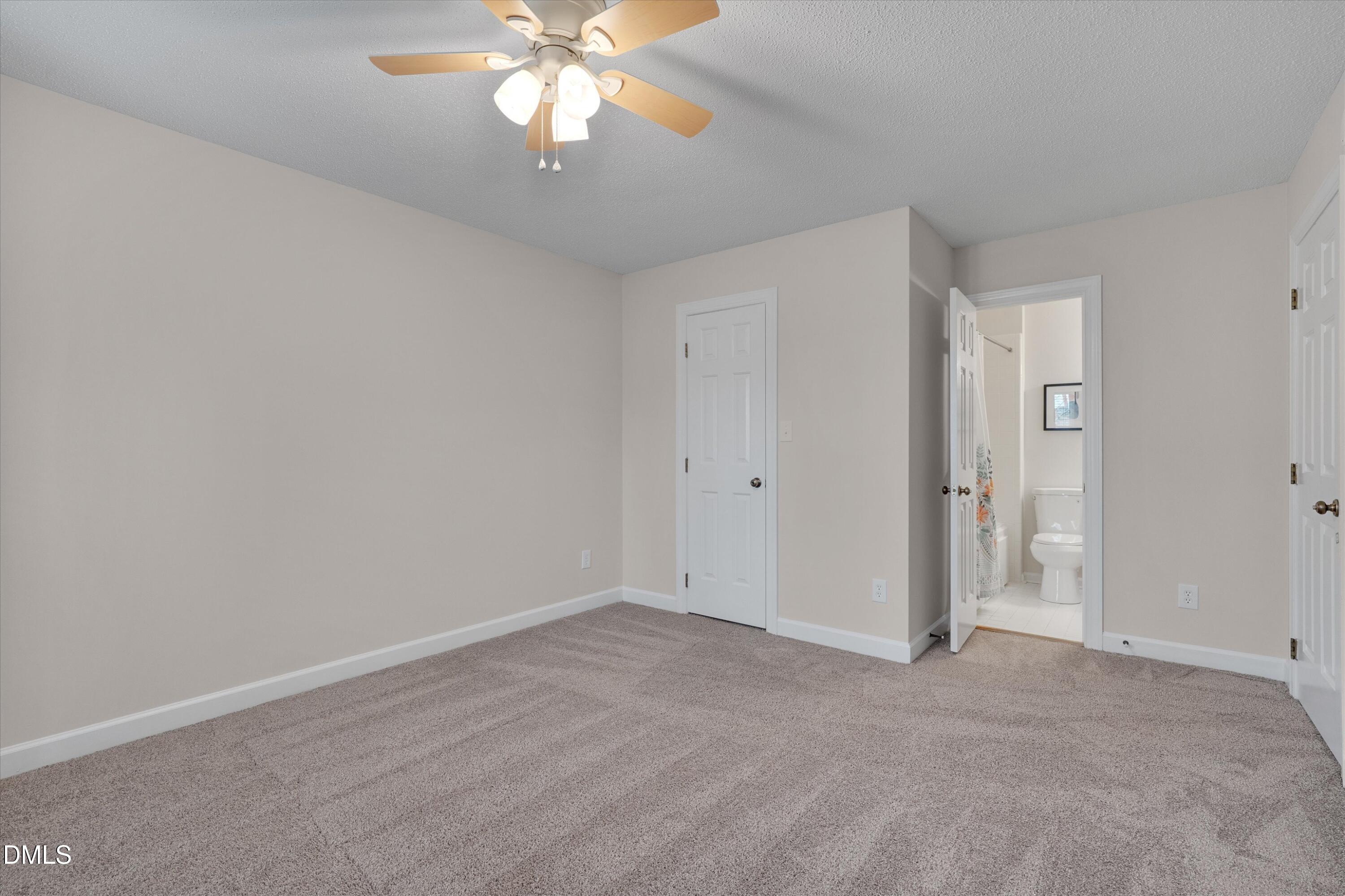3 Preakness Drive Durham, NC 27713 - Photo 30 of 62 a view of an empty room with a fan