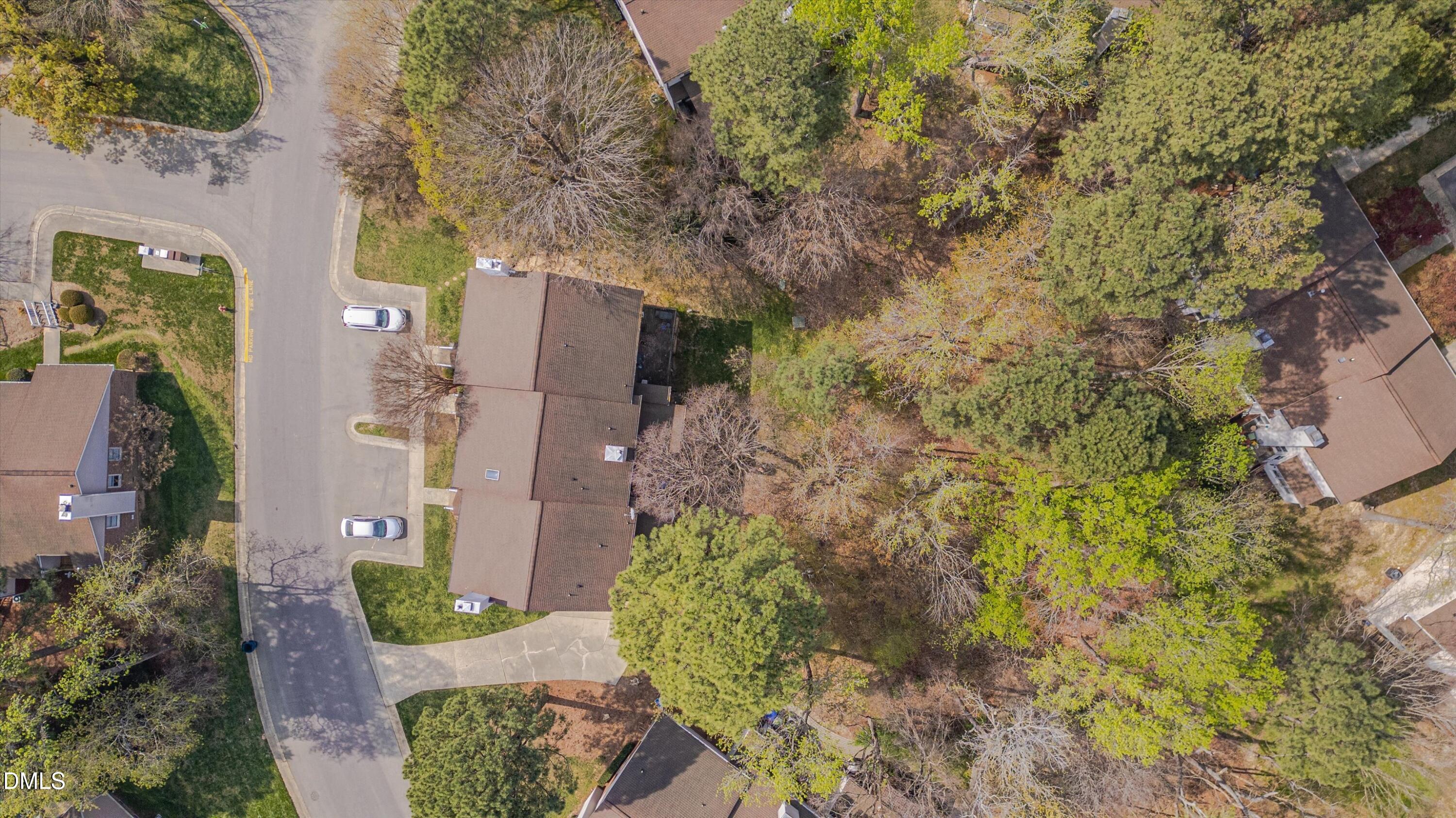 3 Preakness Drive Durham, NC 27713 - Photo 47 of 62 a aerial view of a house with a yard and large trees
