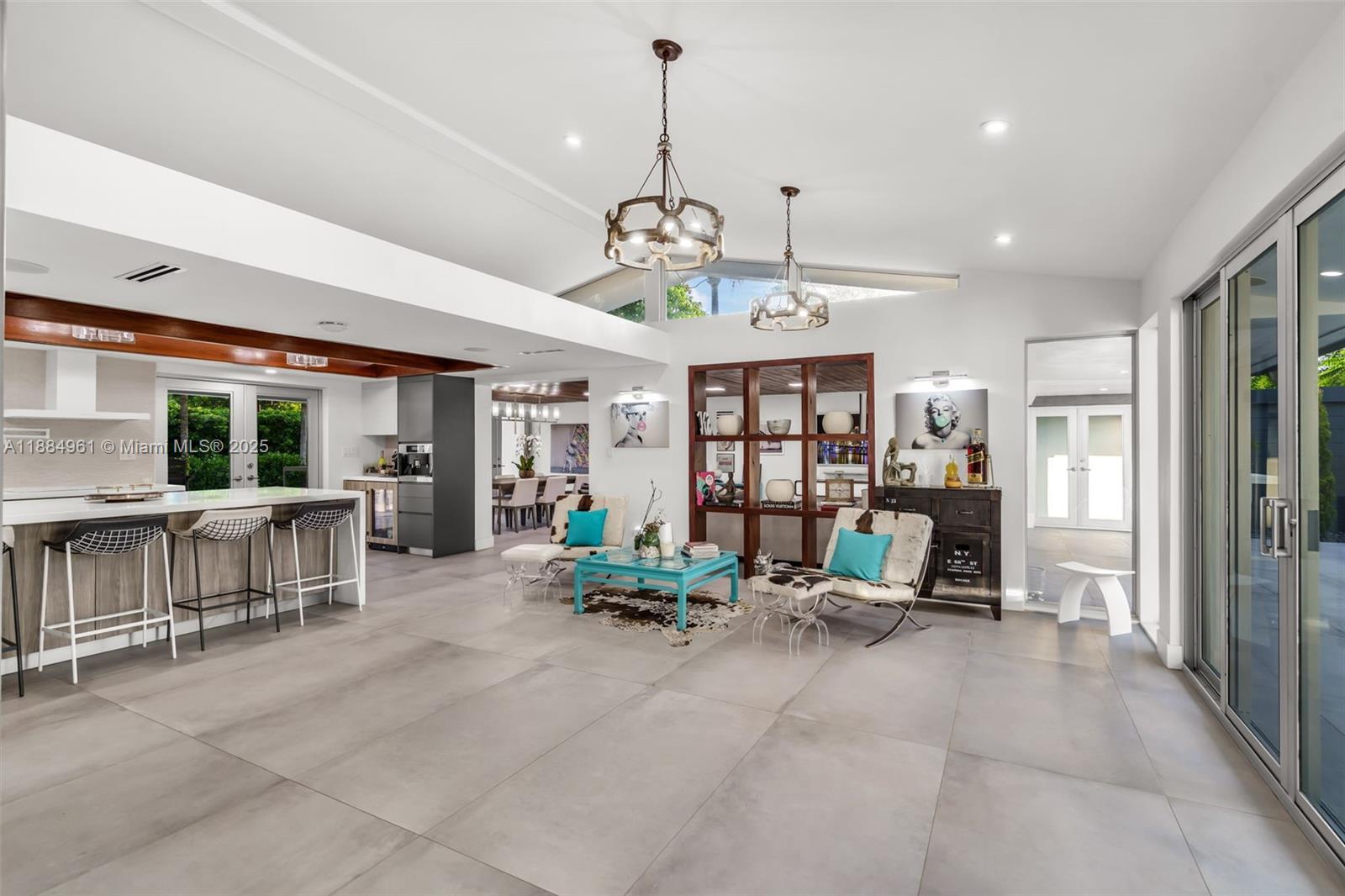 7550 Southwest 60th Street Miami, FL 33143 - Photo 13 of 64 a view of a room with furniture and a chandelier