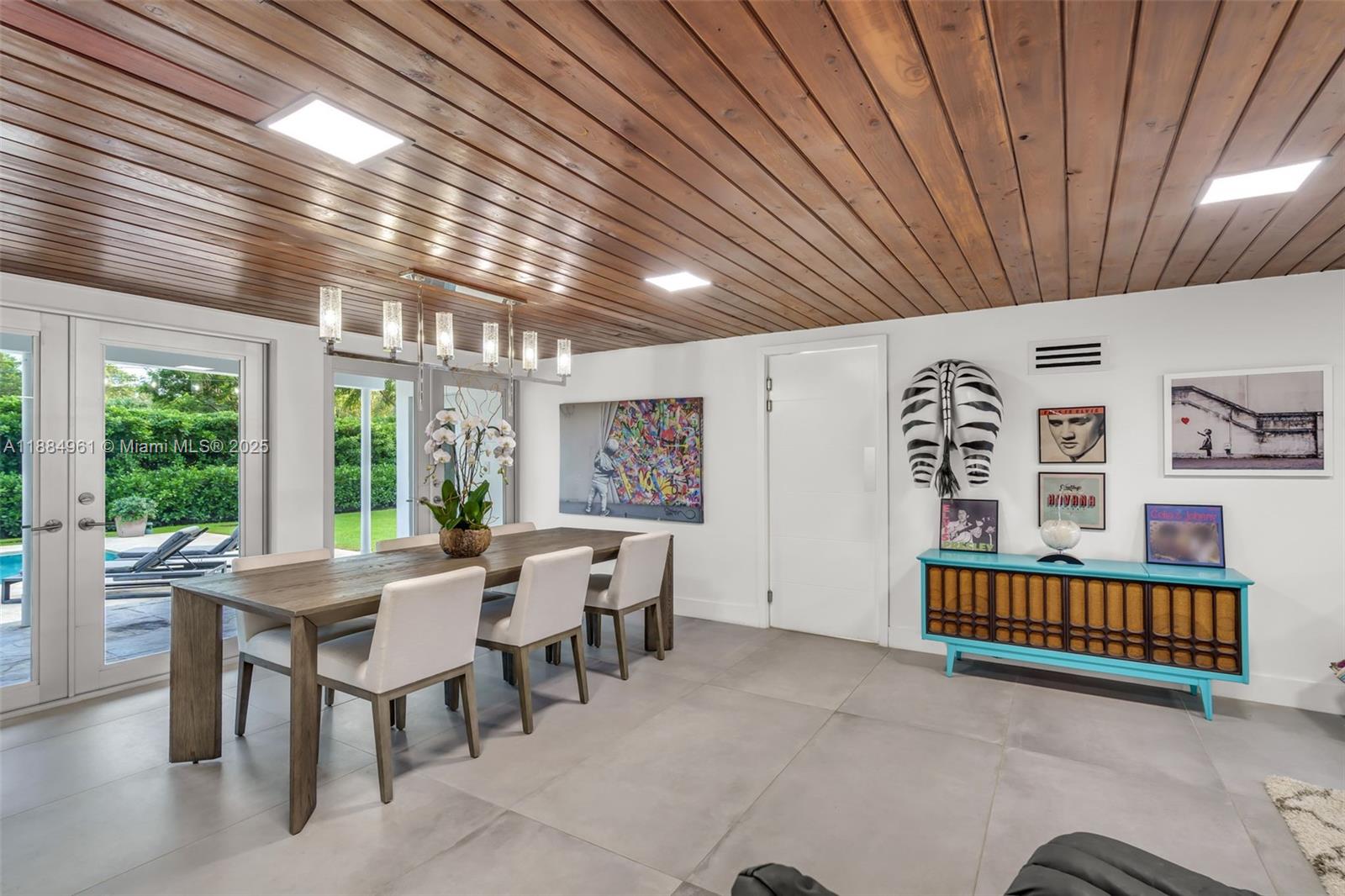 7550 Southwest 60th Street Miami, FL 33143 - Photo 17 of 64 a dining room with furniture and window