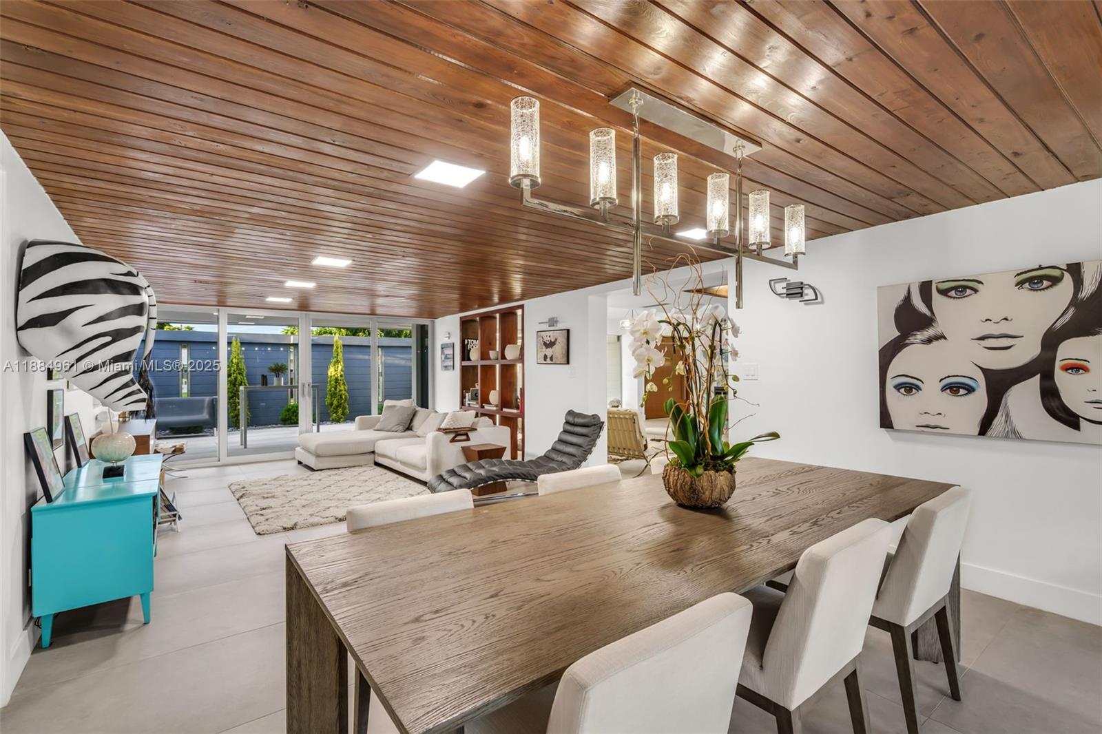 7550 Southwest 60th Street Miami, FL 33143 - Photo 19 of 64 a view of a dining room with furniture