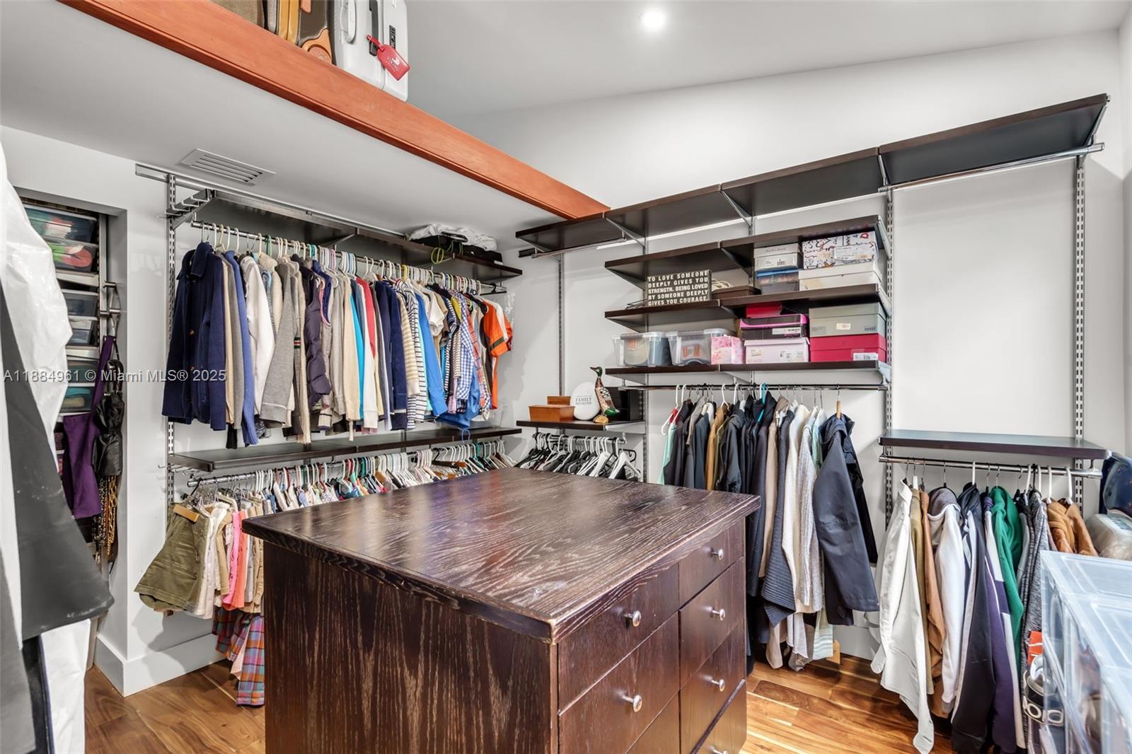 7550 Southwest 60th Street Miami, FL 33143 - Photo 26 of 64 a view of walk in closet with clothes