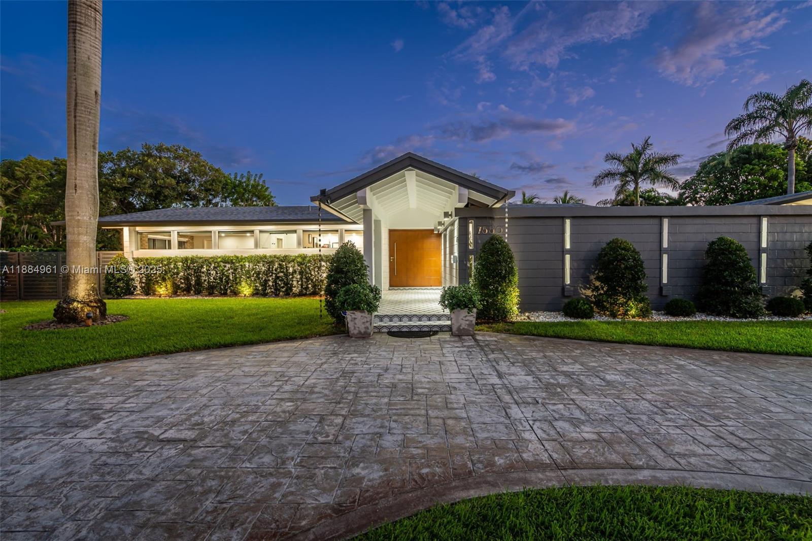 7550 Southwest 60th Street Miami, FL 33143 - Photo 3 of 64 a view of a house with backyard and garden