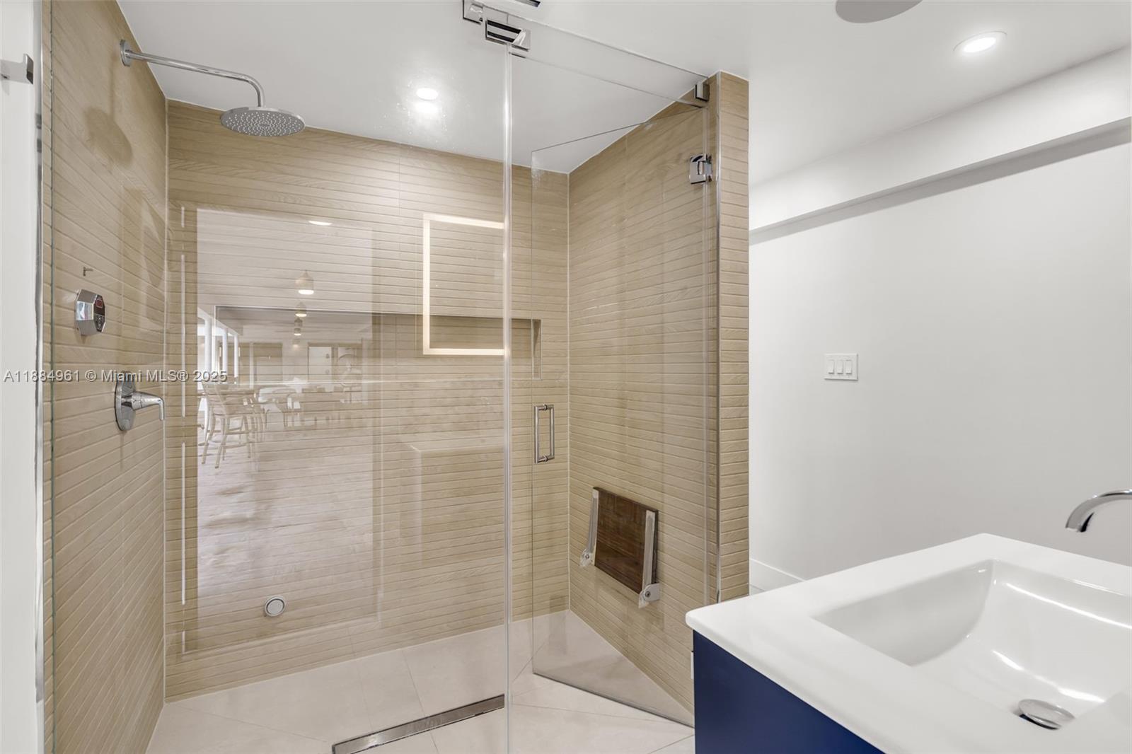 7550 Southwest 60th Street Miami, FL 33143 - Photo 39 of 64 a bathroom with a shower and a sink