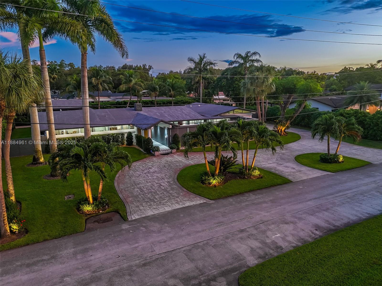 7550 Southwest 60th Street Miami, FL 33143 - Photo 4 of 64 a view of a park with large trees and plants