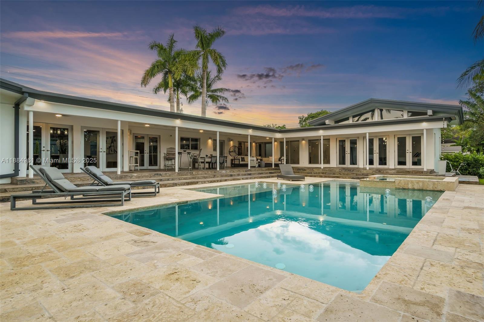 7550 Southwest 60th Street Miami, FL 33143 - Photo 47 of 64 front view of a house with a patio