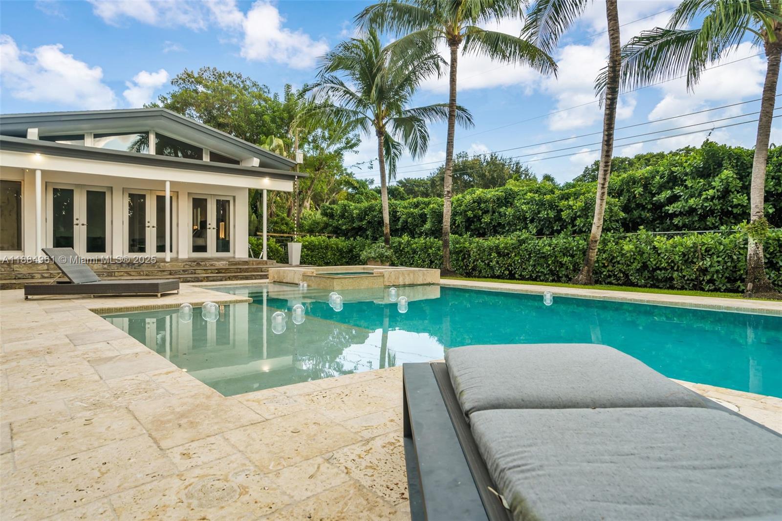 7550 Southwest 60th Street Miami, FL 33143 - Photo 48 of 64 a view of a house with swimming pool