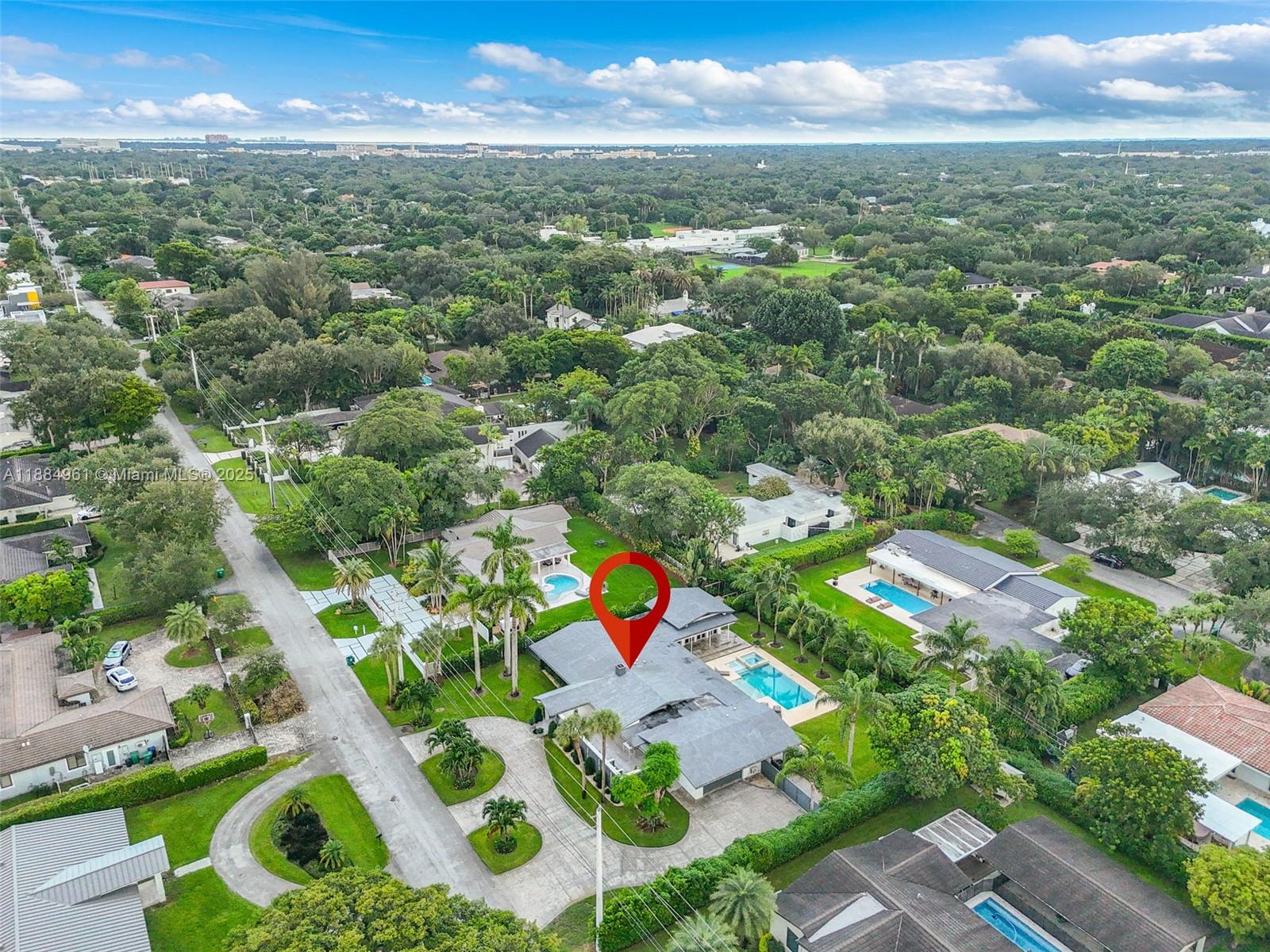 7550 Southwest 60th Street Miami, FL 33143 - Photo 53 of 64 an aerial view of residential houses with outdoor space and trees