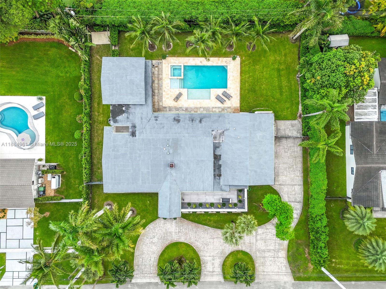7550 Southwest 60th Street Miami, FL 33143 - Photo 56 of 64 an aerial view of a house with pool yard and outdoor seating